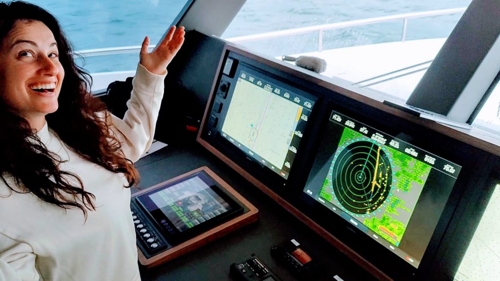 Yacht Delivery Captain on the Helm
