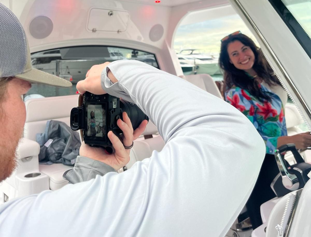 Influencer filming on a boat